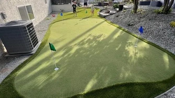 Family backyard putting green install